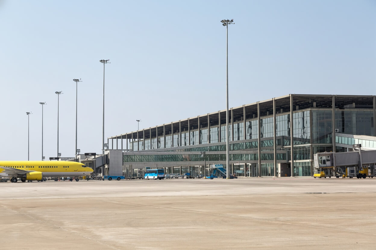 Inside Dalaman Airport terminal near the car rental desks